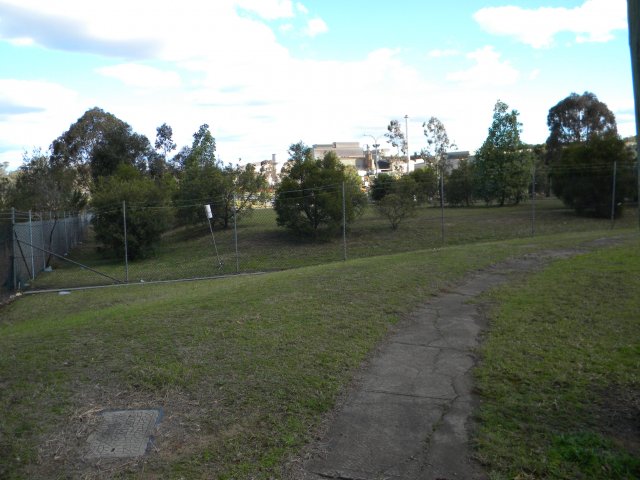 The flat-topped building marks the site of the Rooty Hill Homestead